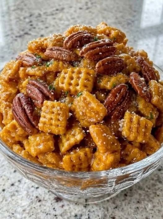 “I poured the pan onto parchment and my son said the buttery pecans and caramel crunch taste like a county fair in a bowl
